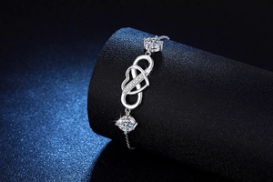 Macro shot of S925 sterling silver infinity heart bracelet with 2ct moissanite detail