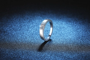 Detailed view of s925 sterling silver ring with a 0.3ct moissanite in minimalist setting