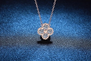 Close-up of rose gold S925 silver four-leaf clover pendant with 1.2ct Moissanite stones