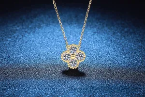 Detailed macro of a 1.2ct Moissanite clover pendant on a rose gold S925 silver chain