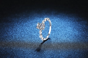 Detailed macro view of S925 sterling silver ring with 1 carat moissanite marquise accent