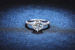 Macro shot of 925 silver ring featuring a 3-carat moissanite with halo diamonds