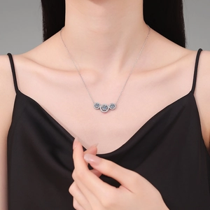 Elegant S925 silver necklace featuring three interconnected rings with a blue moissanite