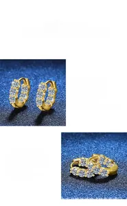 Detail of 18K gold plated Moissanite earrings showing pavé setting and polished finish