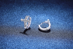 Detailed view of S925 sterling silver cross earrings with pave-set moissanite stones