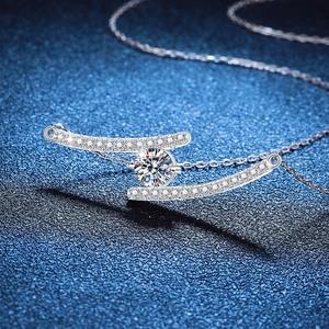 925 Sterling Silver necklace with double-arc pavé Moissanite pendant on blue background