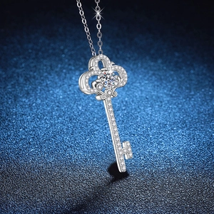 S925 silver twilight key necklace with moissanite stones on a dark blue background