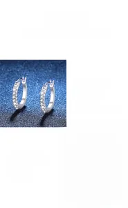 Detailed close-up showing classic 925 sterling silver hoop earrings with moissanite inlay