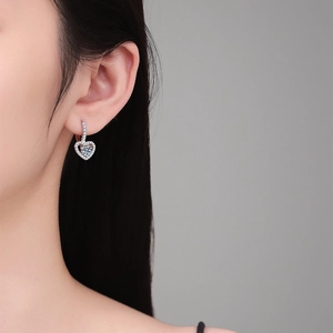 Elegant s925 sterling silver heart earrings with 1 carat moissanite and pave stones