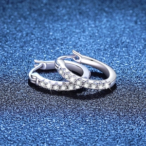 Elegant s925 silver hoop earrings featuring a row of sparkling moissanite stones