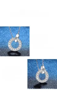 Macro shot of 925 silver moissanite pendant featuring classic round halo setting and fine chain