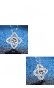 Macro shot of 925 sterling silver starburst pendant with 1ct moissanite and micro-paving
