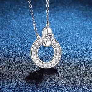 Elegant 925 sterling silver necklace with double ring Moissanite pendant on blue background