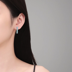 Elegant S925 silver fringe earrings featuring 4-stone light blue moissanite drop pendants