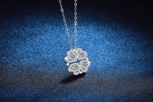 Macro view of S925 sterling silver four-leaf clover pendant with round cut moissanite stones