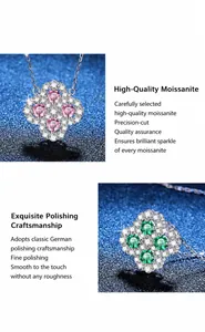 Macro shot of S925 silver four-leaf clover necklaces with pink and green moissanite stones