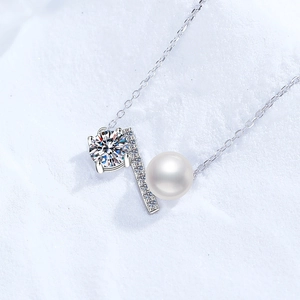 Elegant s925 silver necklace featuring a balance beam pendant with moissanite and pearl