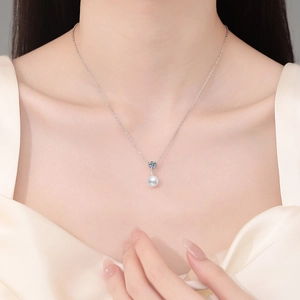 Natural freshwater pearl necklace with silver chain and moissanite stone pendant