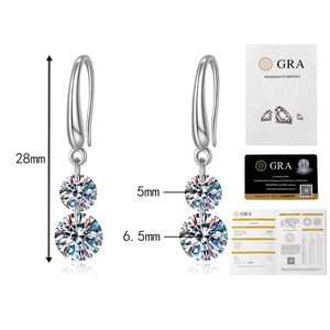 Vue détaillée des boucles moissanite 28mm avec pierres 5mm/6,5mm et certificat GRA