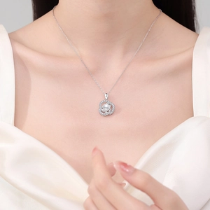 Elegant S925 silver necklace with moissanite floral pendant and white freshwater pearl