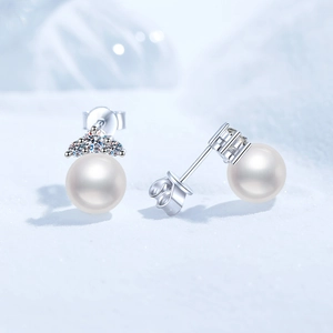 Elegant S925 silver stud earrings featuring round freshwater pearls and moissanite accents