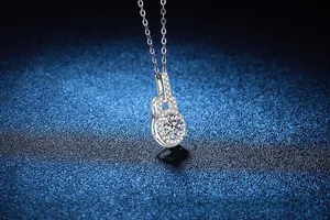 Macro shot of S925 sterling silver gourd pendant necklace featuring a 1ct moissanite stone