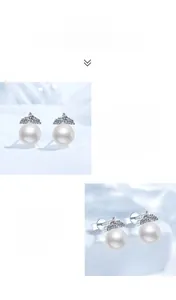 Detail of freshwater pearl earrings with moissanite accents and silver crown setting