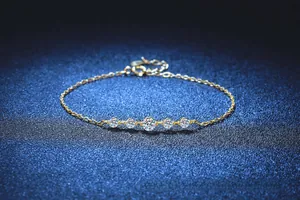 Detailed view of adjustable S925 silver gold bracelet with five moissanite stones