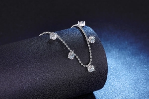 Detail of S925 silver ball chain with five brilliant round-cut moissanite charms