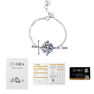 Moissanite ring detail showing GRA certificate and 6.5mm 1.0ct diamond specifications