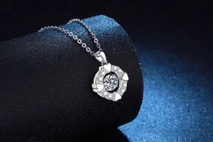 Macro shot of S925 sterling silver heart necklace with a dancing moissanite pendant