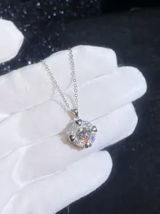 Macro shot of S925 sterling silver heart pendant with shimmering moissanite gemstone