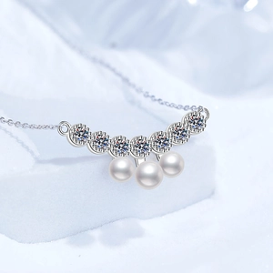 S925 sterling silver moissanite necklace with freshwater pearls in a smiling curve design