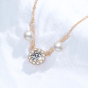 S925 silver gold necklace with moissanite halo pendant and white pearls on white texture