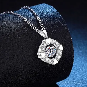 S925 sterling silver heart necklace with dancing moissanite pendant on blue display