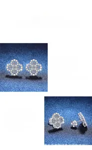 Macro shot of silver four-leaf clover stud earrings with pavé moissanite detailing
