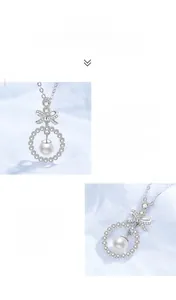 Macro detail of bow-knot necklace featuring moissanite pavé ring and round freshwater pearl