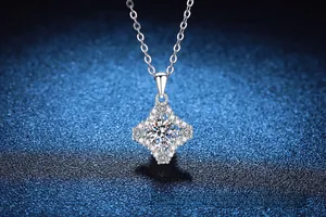 Macro shot of S925 sterling silver four-pointed star pendant with 1ct moissanite