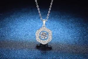 Macro shot of S925 sterling silver Mobius necklace with sparkling moissanite pendant center