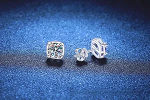 Detail view of square moissanite stud earrings in S925 silver with four-claw setting