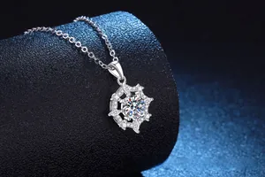 Detail of 925 silver star pendant necklace with 1 carat sparkling moissanite center stone