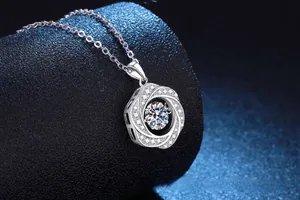 Macro shot of S925 sterling silver Moebius necklace with a shimmering moissanite stone