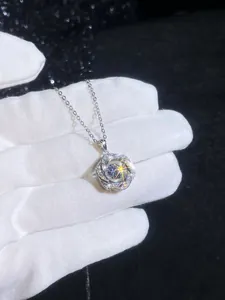 Detail of S925 silver pendant with hollow flower petals and sparkling inlaid zircons