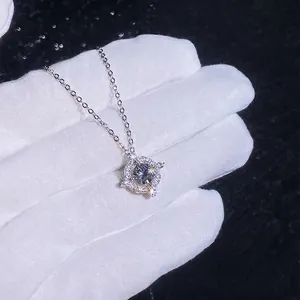 925 sterling silver necklace with a sparkling round D-color moissanite Saturn pendant