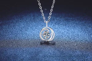 Macro shot of 925 sterling silver swan necklace pendant with brilliant moissanite stone