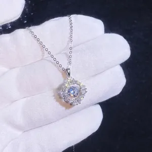 925 sterling silver necklace with sparkling 1 carat moissanite pendant on a cross chain