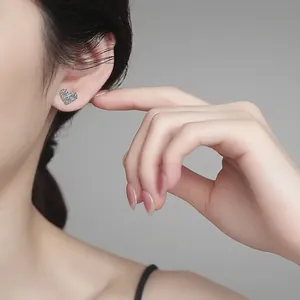 Elegant S925 sterling silver heart stud earrings with sparkling pavé cubic zirconia
