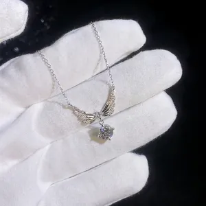 Elegant S925 sterling silver angel wing necklace with a sparkling round moissanite stone