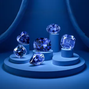 Macro shot of lab-grown sapphire gems in various cuts like heart, pear and emerald shapes