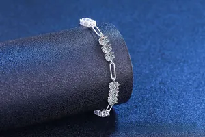 Close-up of S925 silver link bracelet featuring 5.4ct moissanite stones and cubic zirconia